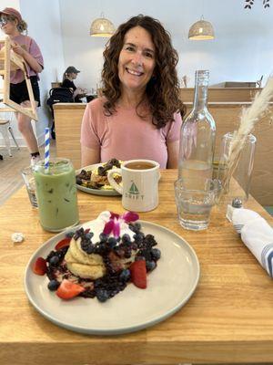 Berry stack, iced matcha latte, scrambled toast, and hot Americano with caramel