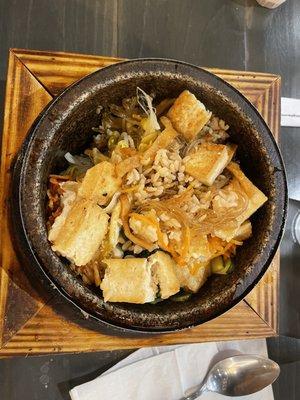 Hot stone pot bibimbop with brown rice and tofu.