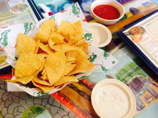 Always Fresh, Hot, and Crunchy Chips with Salsa and their Special White Sauce. Yummy!