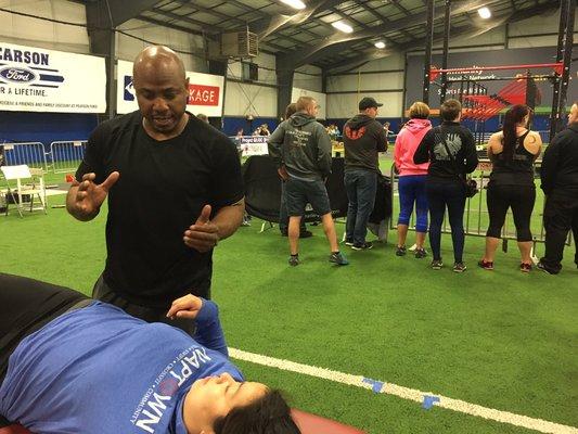 Terrence Wilkins, FST explains fascial stretching at a CrossFit GLOC competition.