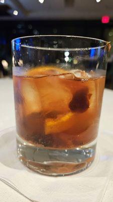 Whistle Pig Rye Old-Fashioned with muddled orange and cherry.  It was lacking sweetness and alcohol.