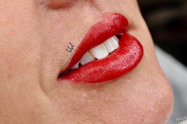 Full lip tattoo