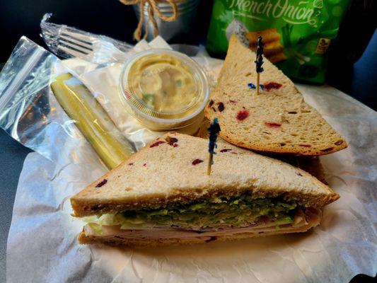 Aspen Sandwich. It has oven-roasted turkey, with the usual veggies and avocado. But the real star is the cranberry bread!