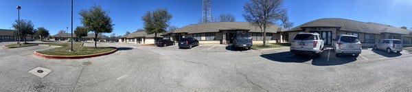 Parking lot directly behind the the Greg Chapman Motors. Mitsubishi dealership is directly after the entrance to offices.