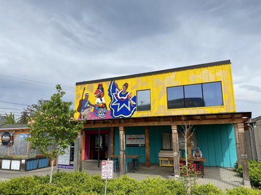 The Portland Mercado main building from the small free parking lot