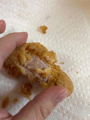 Raw chicken strip from Steak n' Shake kids meal