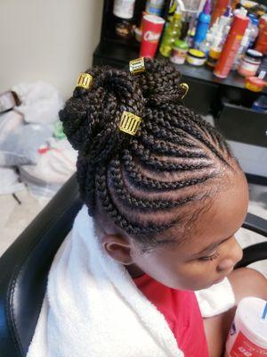 Kids con rows braids