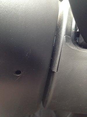 Sloppy hand-drilled holes/misaligned dash Marvin K. Brown "repair" of my new Cadillac!