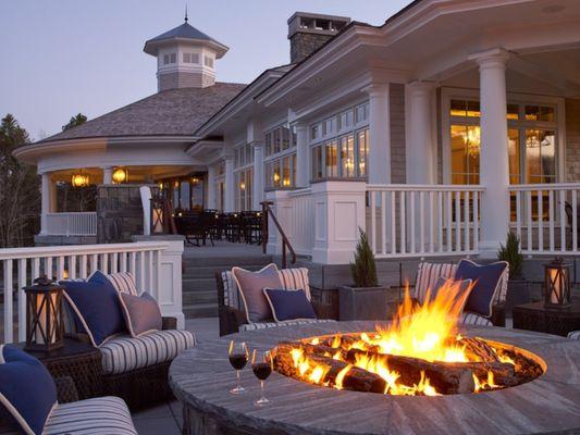 Enjoy a glass of wine with friends at the cozy firepit just outside of Paul's Steak House at the beautiful Boothbay Harbor Country Club.