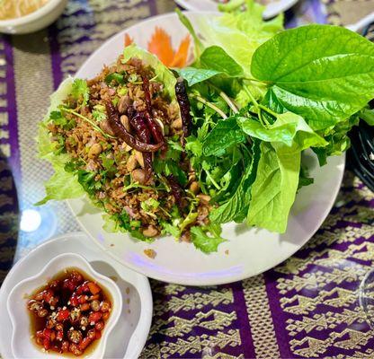 Nam khao and Thai chili pepper with fish sauce