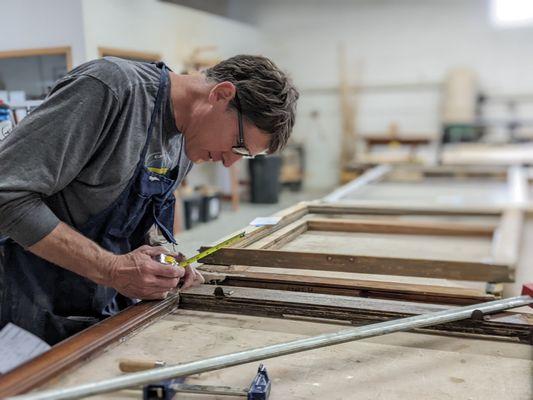 Stabilizing and squaring window sashes during the restoration process.