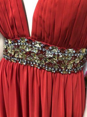 Red Marilyn Monroe Halter Style Long gown With jewel trim.