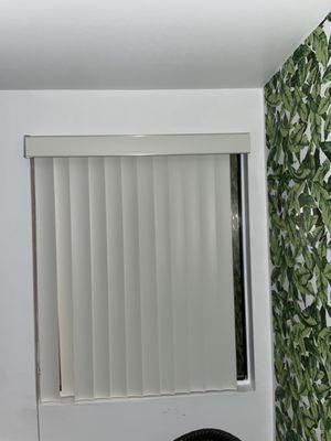 Bedroom shade with missing slats.