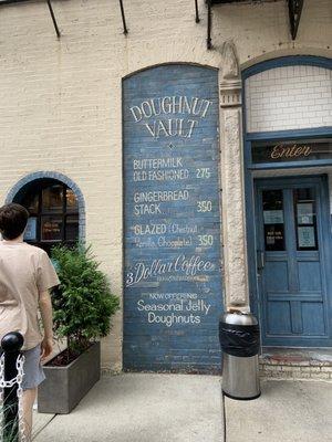 Perusing the options at the terrifically charming Doughnut Vault.