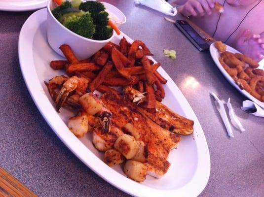 Seafood Sampler and onion rings/shrimp in the back