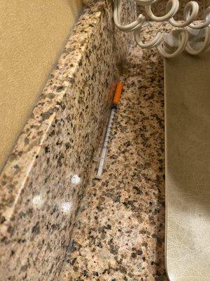 Needle found in the bathroom beside ice tray smh