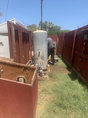 Leroy and company doing the most professional removing of the tank