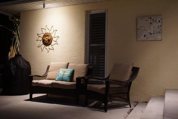 White powder-coated Brass LED Down Lights blend into the soffits, helping this wall feature to be the shining star of the back patio space.