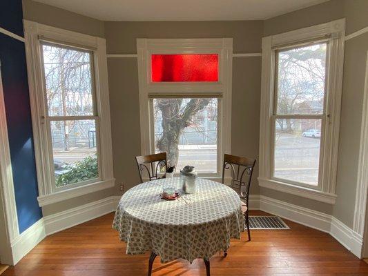 The homeowner wanted a neutral grey on the walls to highlight a pristine white gloss on the windows and trim.