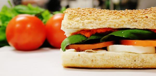 The Capri:  Hand-made fresh mozzarella, red pepper pesto, tomato,  basil, aged balsamic vinegar