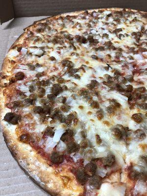 Crispy Thin Crust Pizza with Italian Sausage and Onions (close-up!!!)