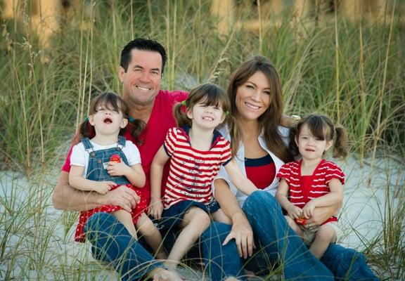 Dr McDowell and his wife Katie with their 3 daughters