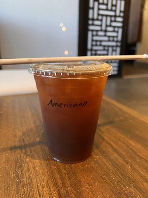 Iced americano, comes in one size but you can make larger for 50 cents. No tall, grande, vente stuff. Thank god!!!!!