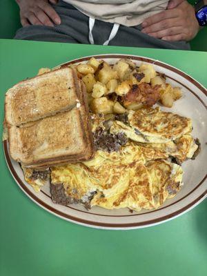 Steak and cheese and mushroom omelette