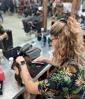 Who said Barbers were only men... 
 
 This student is loving her hands on training.