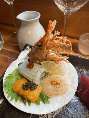 Part of the Omakase option. Sea urchin, scallop, fried prawn and squid.