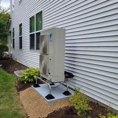 Daikin VRV Life cold weather heat pump, connected to a high efficiency gas furnace back up heating system.