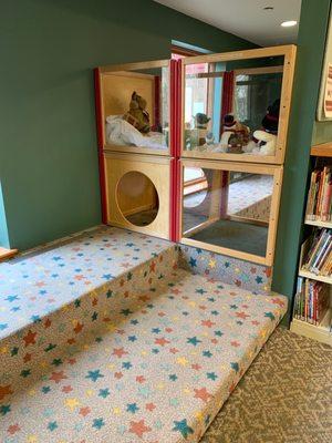 Children's room corner with a cave structure