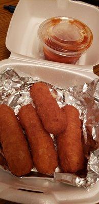 Mozzarella sticks with marinara sauce.  5 were included, hubby ate one before I caught the picture.