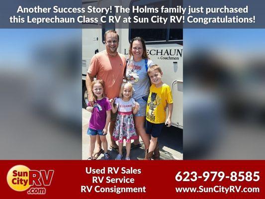 Holms family with their new RV from Sun City RV!