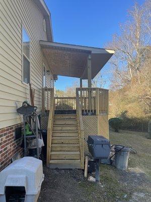 Added a roof and resurfaced the deck, add privacy lattice underneath with access door.