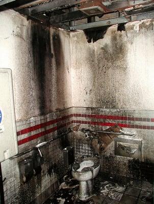 A derelict bathroom in a mall that had a huge sewage leak.