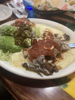 One of our keto faves..rolled steak with bacon, cheese, double salad, no rice and beans, BYO zero carb tortillas!!