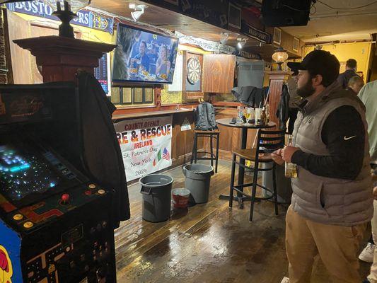 Darts and college hoops won't be stopped by a little rain.