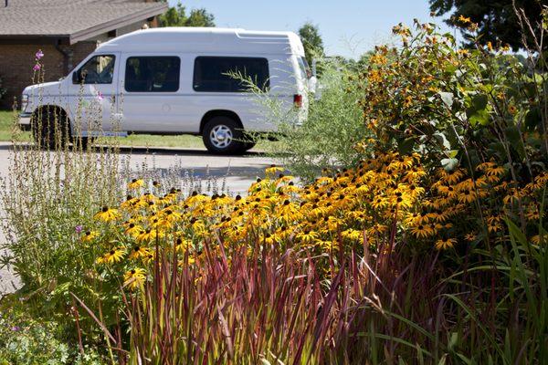 Our company tour van and prairie flowers. #thingstodoinchicago