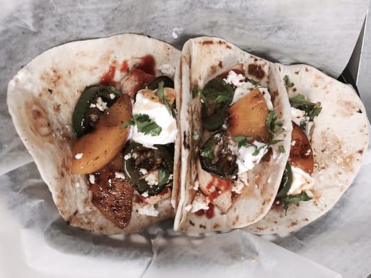 ROOF ON FIRE TACOS topped with Parker county peaches to help cool the burn on the roof of your mouth.