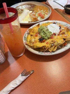 super nachos, tequila sunset, trio enchiladas