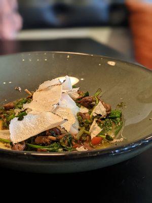 Raviolo - scape salmoriglio, lavage butter, poached egg, mousseron mushroom, summer truffles, wrinkly watercress