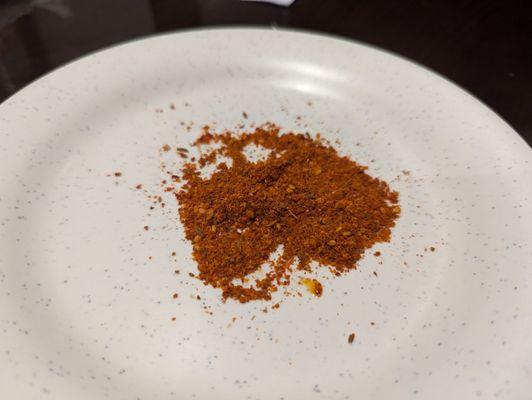 Spice blend provided at table when you first sit down.