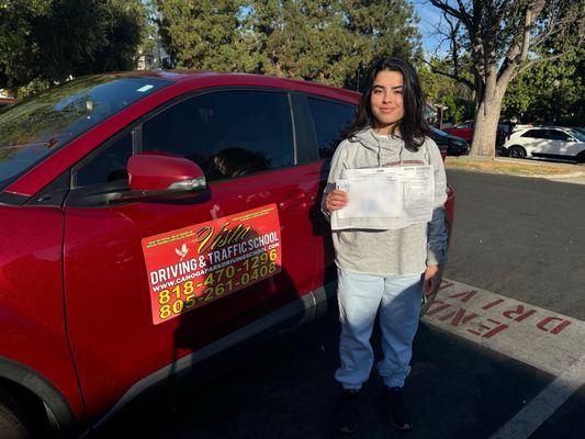 My daughter after passing her driving test.