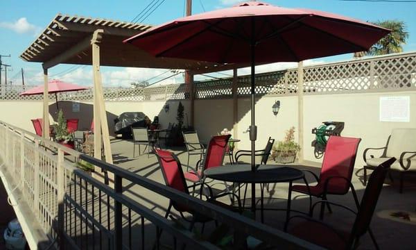 Sun deck and BBQ above the carports