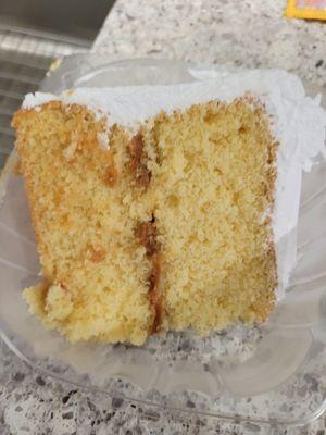 Slice of dominican cake- super moist, super soft, delicious with just the right amount of frosting and sweetness!