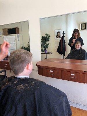 Not easy for a high school freshman love his haircut. Ly is the best and has been doing it for years!