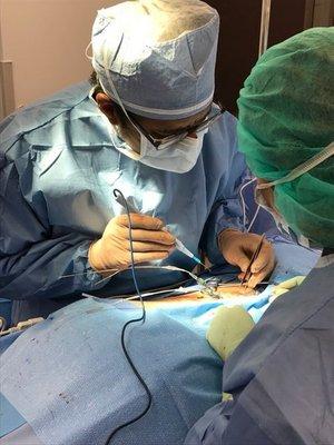 Dr. Kondamuri using the latest advancements in minimally invasive treatments for pain relief.