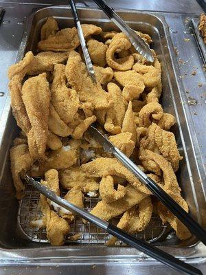 Mounds of fried fish.  Was hoping it was catfish, but it weren't.