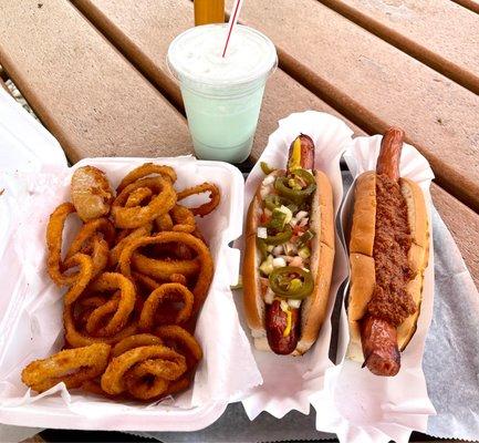 Left to right - Buster's own onion rings, small pistachio milkshake, Chicago hot dog, Michigan dog with tangy meat sauce topping